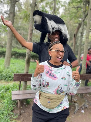 Visitors feeding Colobus Monkey at Lake Hawassa, South Ethiopia